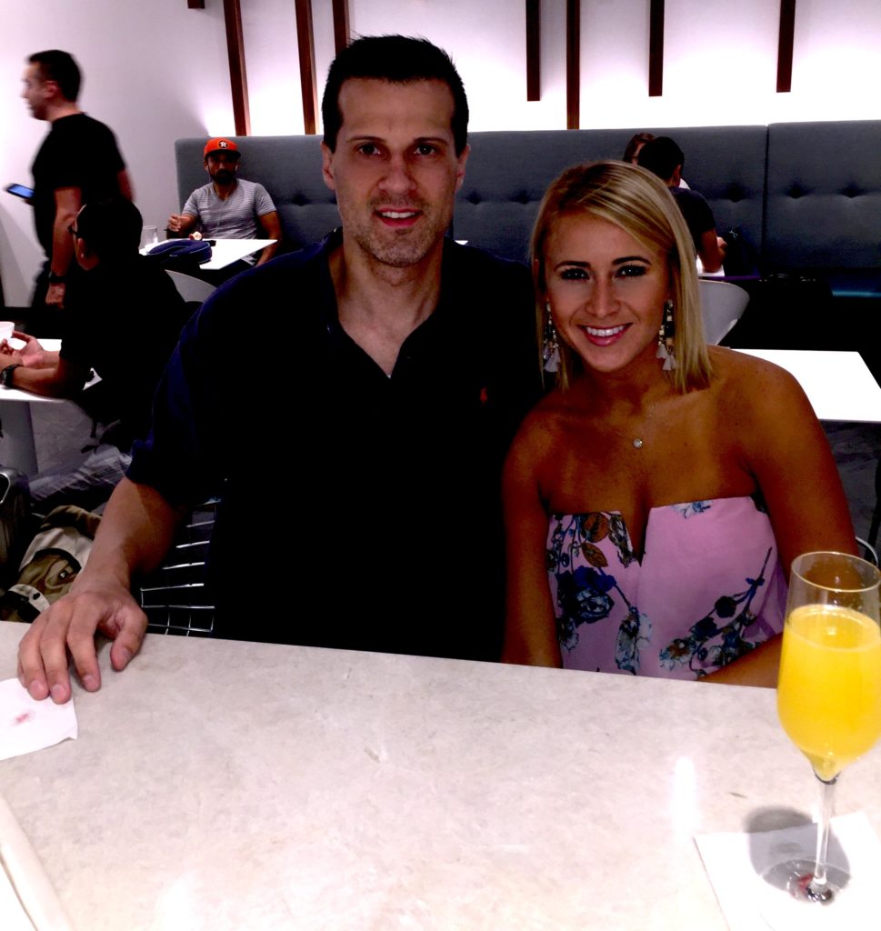 Enjoying some breakfast and mimosas at the IAH Centurion Lounge
